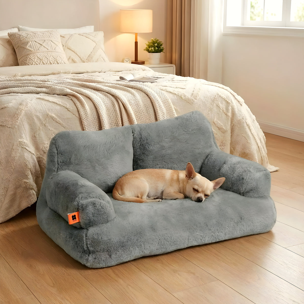 Canapé douillet à rebords hauts pour petit chien