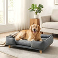 Canapé lit sur pieds en bois avec coussin pour chien