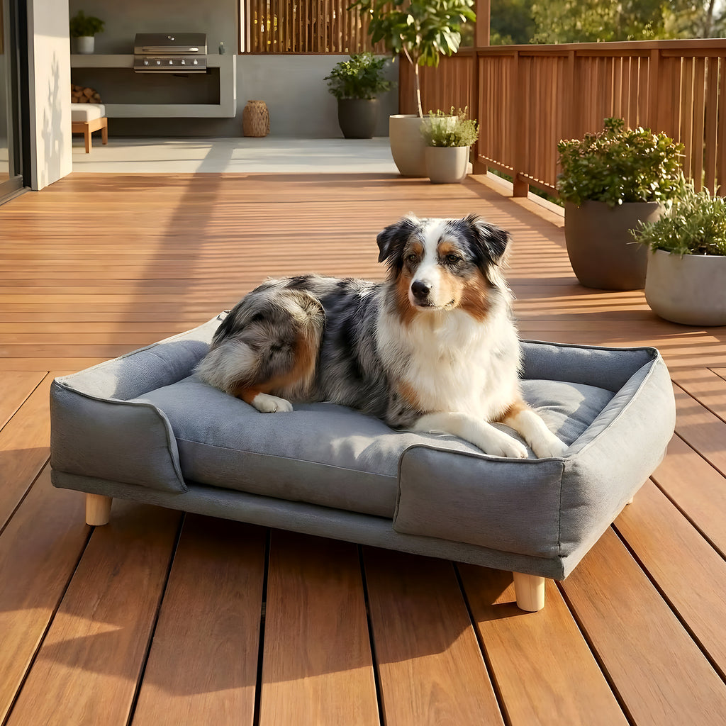 Canapé lit sur pieds en bois avec coussin pour chien