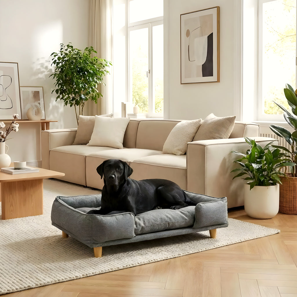 Canapé lit sur pieds en bois avec coussin pour chien
