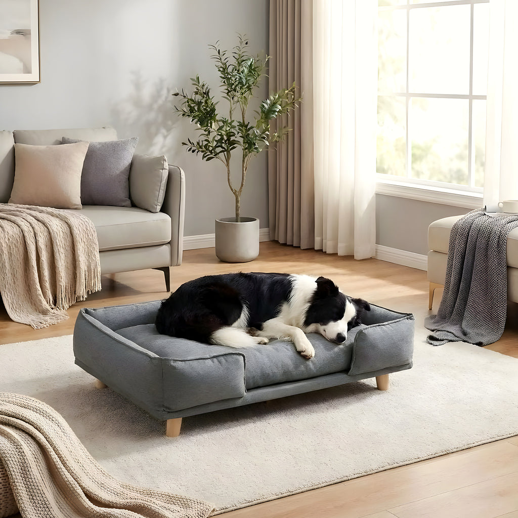 Canapé lit sur pieds en bois avec coussin pour chien