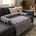 Tapis-lit en fausse fourrure avec traversin pour chien